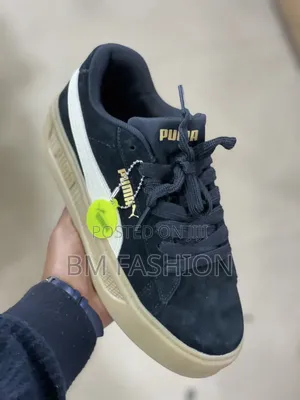 Black Suede Puma Sneakers Featuring a Thick Textured Gum Sole