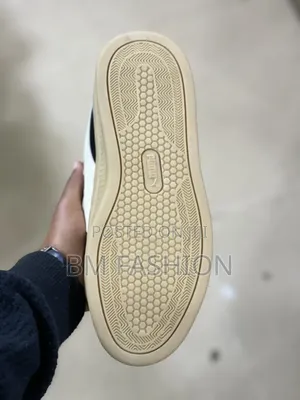 Black Suede Puma Sneakers Featuring a Thick Textured Gum Sole