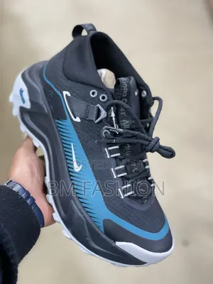 Lack and Teal Nike ACG Trail Sneaker With a Vibram Outsole