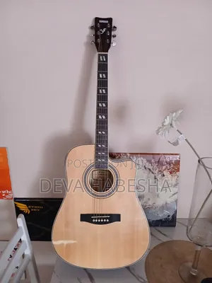 Acoustic Guitar (ጊታር)
