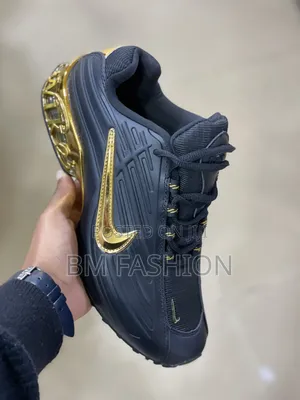 Nike Air Max With Metallic Gold Accents, Including Gold Nike Swoosh