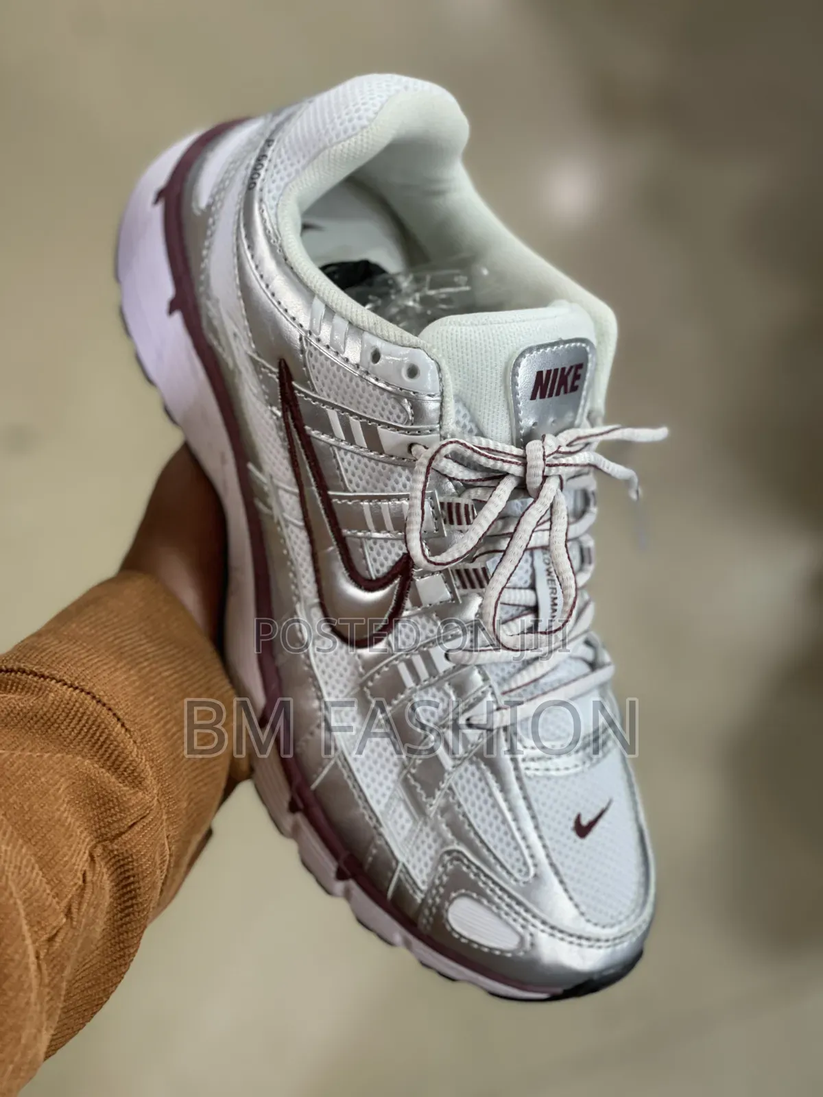 Of Nike P-6000 Sneakers Featuring a Shiny Metallic Silver Mesh Upper