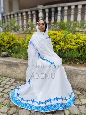 Elegant White Habesha Kemis With Gold Orange Embroidery