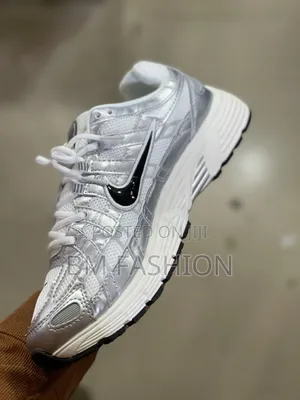 Nike P-6000 in a White and Metallic Silver Colorway With a Black Swosh