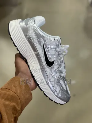 Nike P-6000 in a White and Metallic Silver Colorway With a Black Swosh