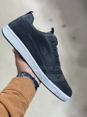 Cat Dark Blue Flat Shoe Leather With Embossed CAT Branding on the Side