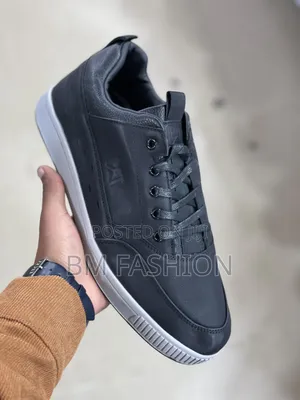 Cat Dark Blue Flat Shoe Leather With Embossed CAT Branding on the Side