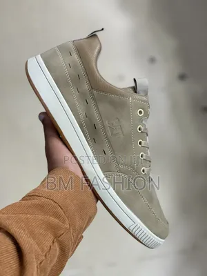 Beige (CAT) Casual Leather Sneaker a White Flat Sole and Tonal Laces