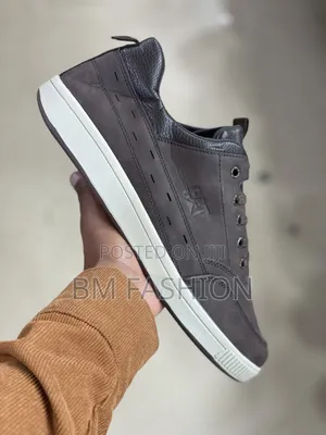 Leather (CAT) Casual Sneaker White Rubber Sole and Tonal Stitching
