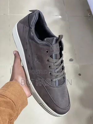 Leather (CAT) Casual Sneaker White Rubber Sole and Tonal Stitching