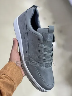 New Arrival Caterpillar Casual Leather Sneaker With a White Flat Sole