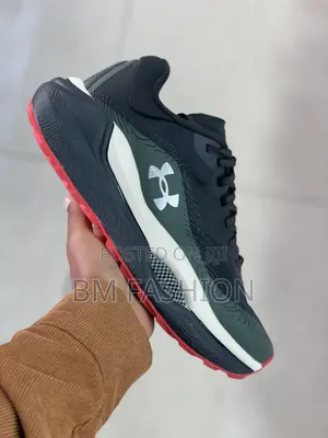 Under Armour Charged Revitaliz Running Sneaker Featuring Dark Colorway