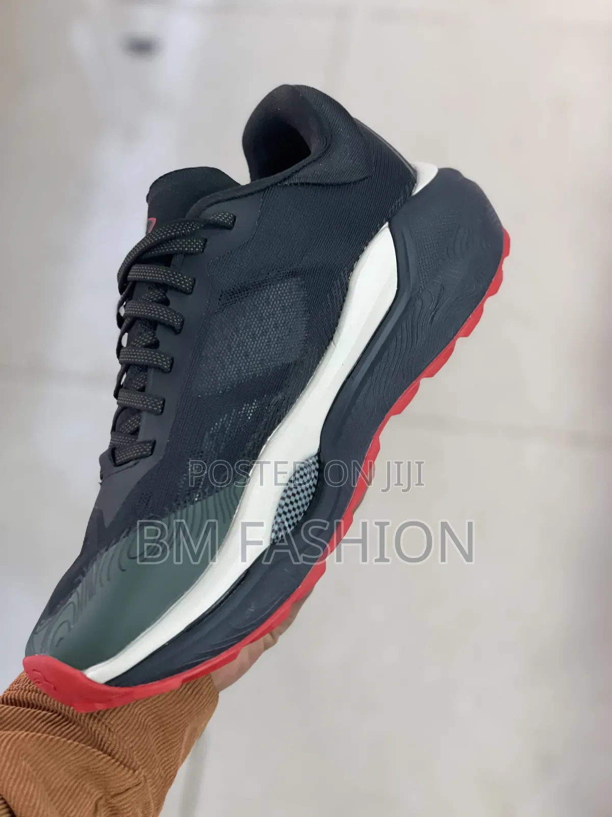 Under Armour Charged Revitaliz Running Sneaker Featuring Dark Colorway