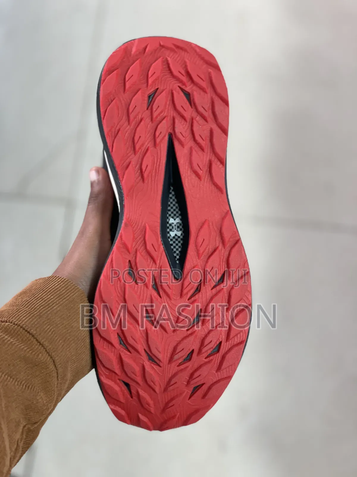 Under Armour Charged Revitaliz Running Sneaker Featuring Dark Colorway