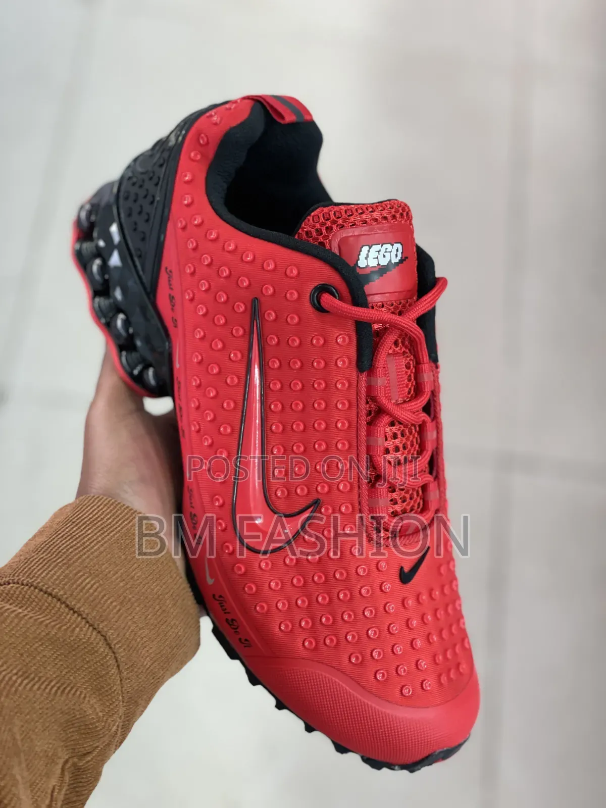 Nike Sneaker Featuring a Textured Upper and a Distinct LEGO Logo