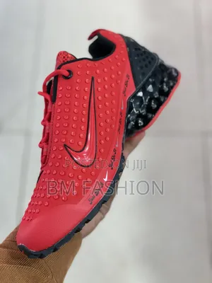 Nike Sneaker Featuring a Textured Upper and a Distinct LEGO Logo