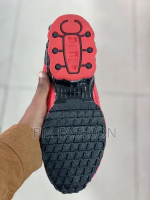 Nike Sneaker Featuring a Textured Upper and a Distinct LEGO Logo
