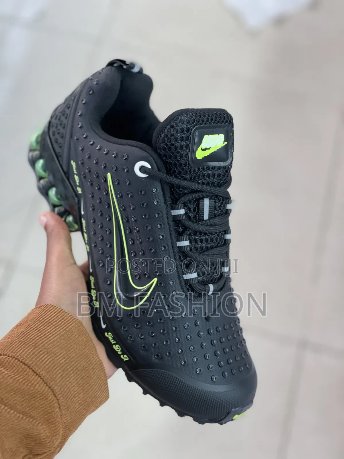 Nike Lego Replica Model Featuring a Vibrant Lime Green Swoosh