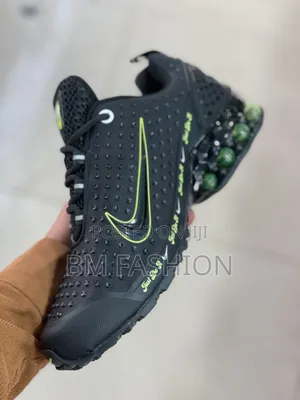 Nike Lego Replica Model Featuring a Vibrant Lime Green Swoosh