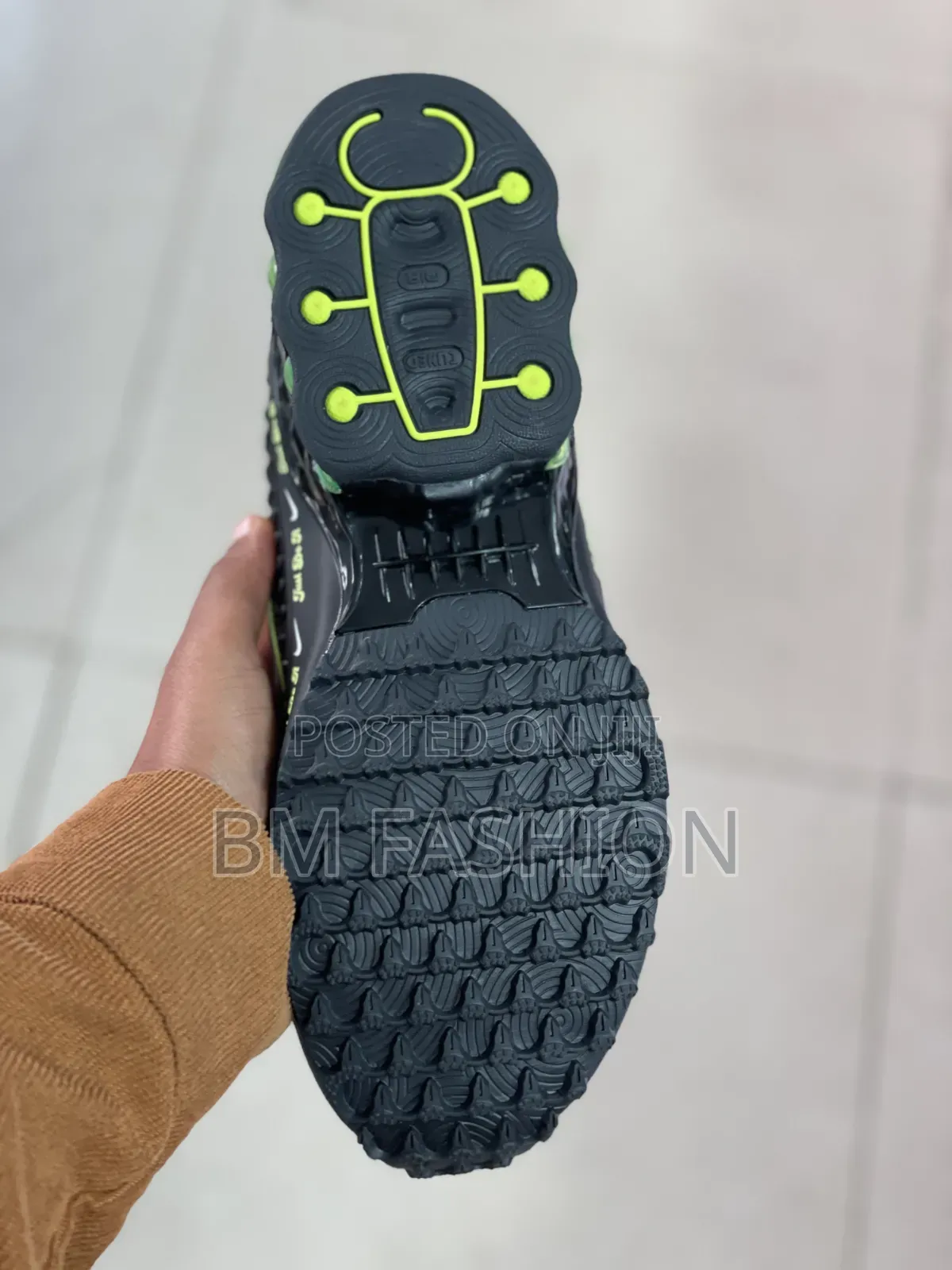 Nike Lego Replica Model Featuring a Vibrant Lime Green Swoosh