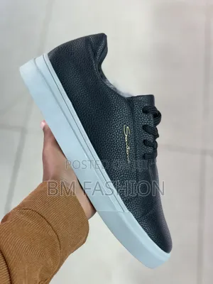 Santoni Black Grained Leather Low-Top Sneaker From the Luxury Brand
