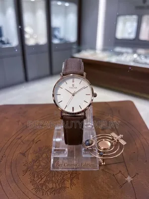 Rose Gold Round Dial / Brown Leather