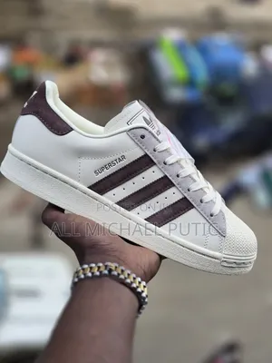 Adidas Superstar Sneaker Featuring a White Leather Upper