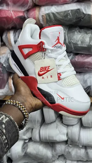 Air Jordan 4 Retro Sneaker "Bike Air" Red-and-White Hangtag