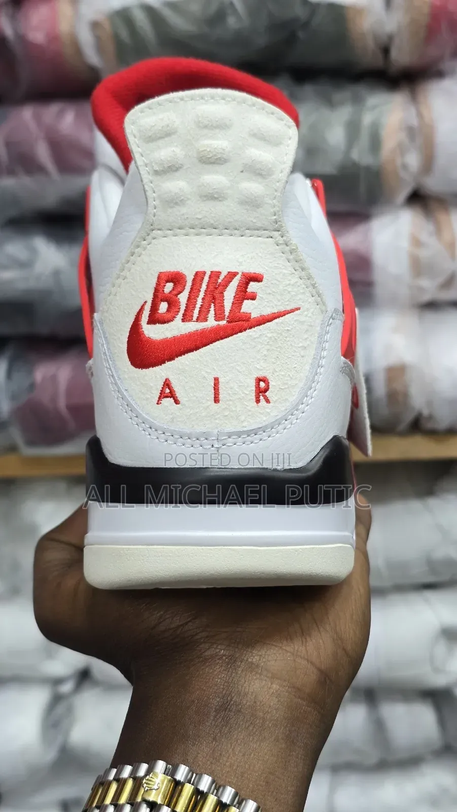 Air Jordan 4 Retro Sneaker "Bike Air" Red-and-White Hangtag