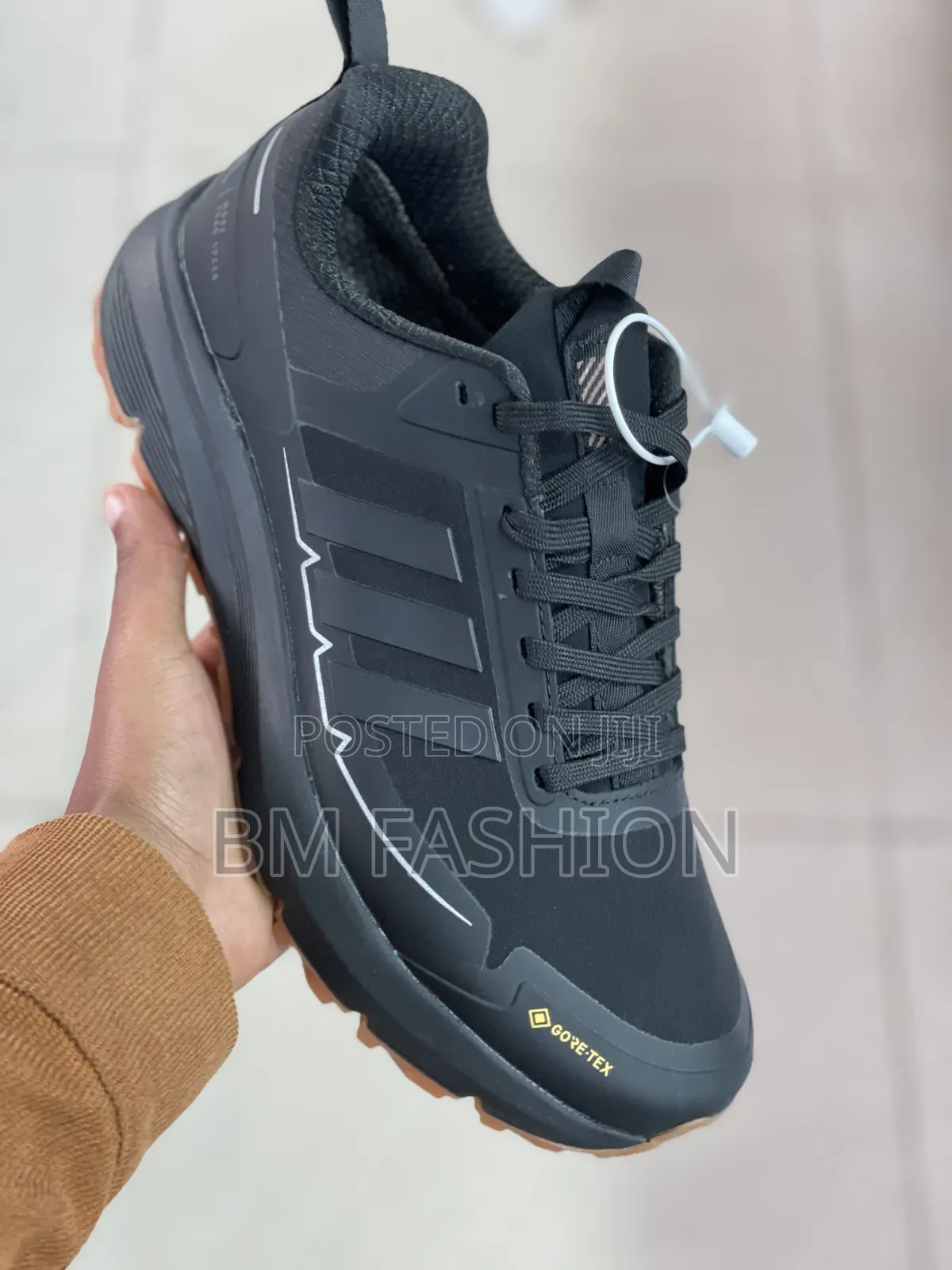 Adidas Gore-Tex Sneakers Featuring a Contrasting Textured Gum Outsole