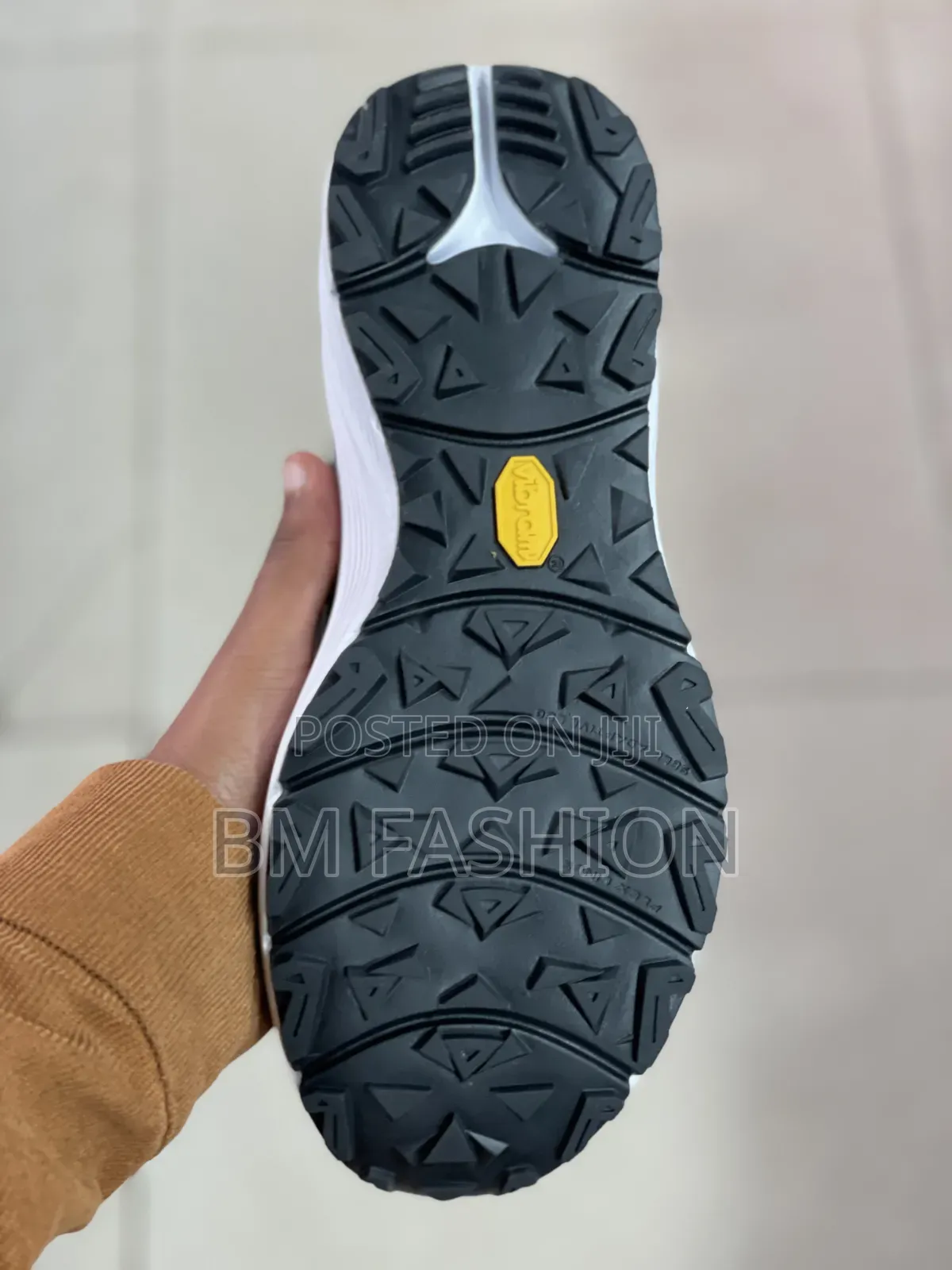 Black-and-White Adidas Athletic Sneaker Featuring Three-Stripe