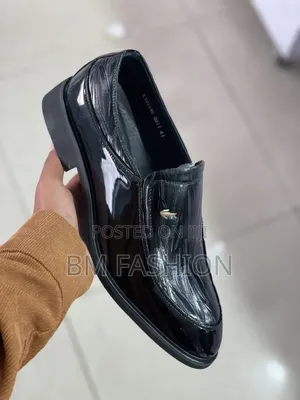 Black Glossy Men's Slip-on Dress Shoe Featuring a Textured Finish
