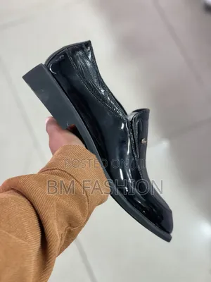 Black Glossy Men's Slip-on Dress Shoe Featuring a Textured Finish