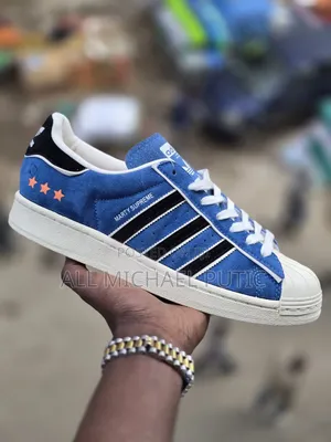 Blue Suede Supreme X Adidas Superstar Sneaker Featuring Black Stripes