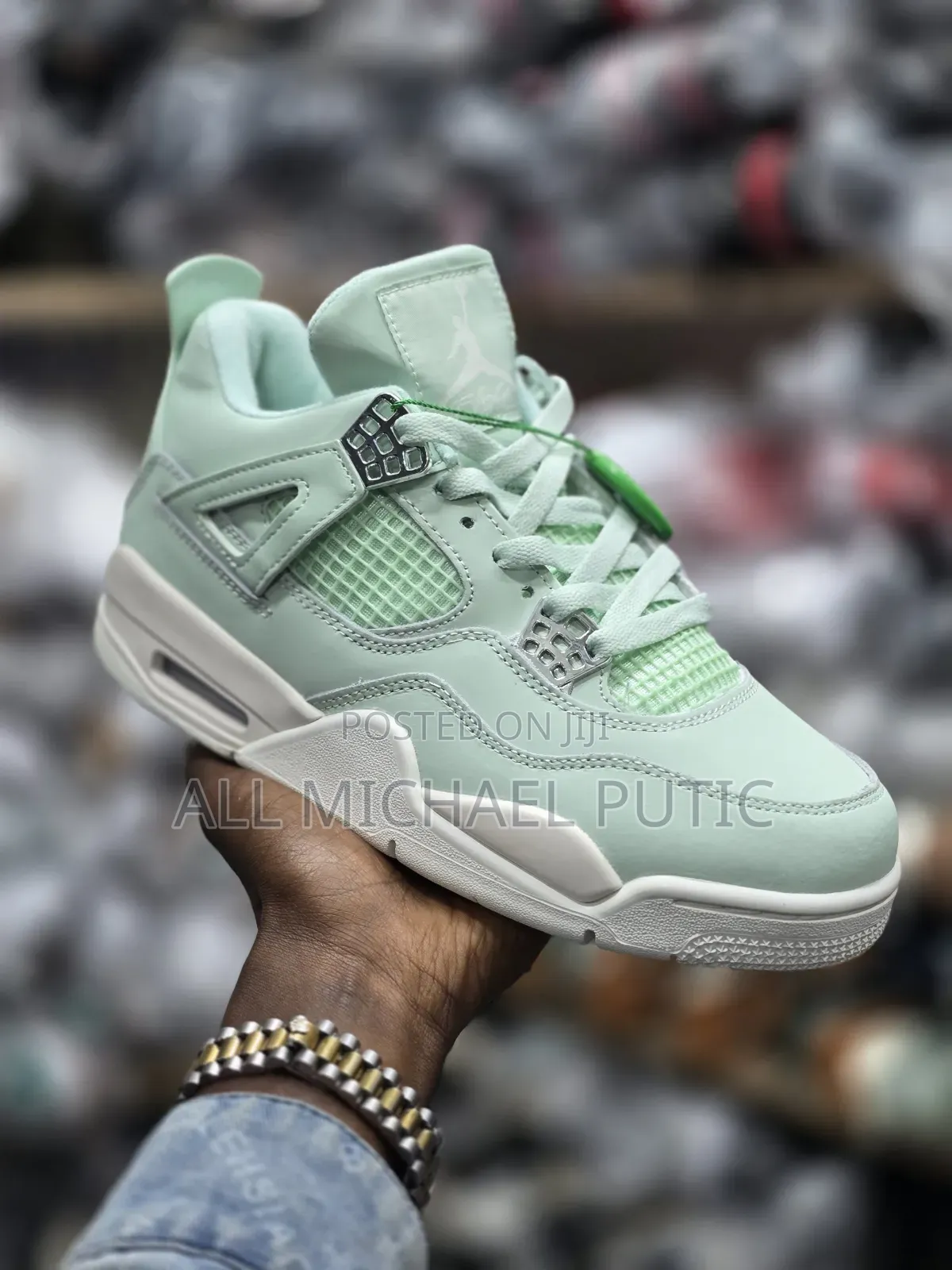 Light Mint Green Nike Air Jordan 4 Retro Sneaker With Silver Eyelets
