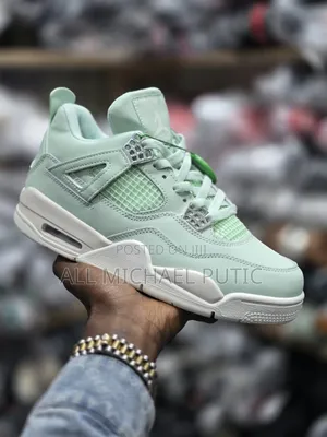 Light Mint Green Nike Air Jordan 4 Retro Sneaker With Silver Eyelets