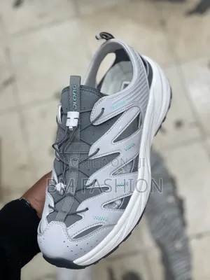 Light Gray and Dark Gray Athletic Hybrid Sandal Featuring Cutouts