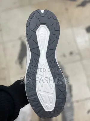 Light Gray and Dark Gray Athletic Hybrid Sandal Featuring Cutouts