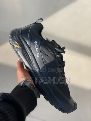 Black Columbia Waterproof Outdoor Sneaker Featuring a Textured Sole