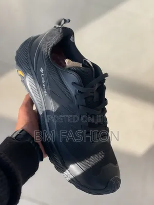 Black Columbia Waterproof Outdoor Sneaker Featuring a Textured Sole