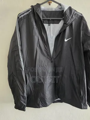 Nike Lightweight Hooded Windbreaker Jacket