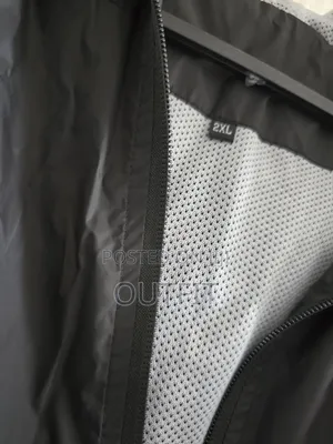 Nike Lightweight Hooded Windbreaker Jacket