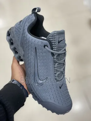 Nike Men’s Gray Athletic Sneakers – Sporty Cushioned Casual Shoes