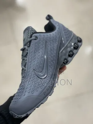 Nike Men’s Gray Athletic Sneakers – Sporty Cushioned Casual Shoes