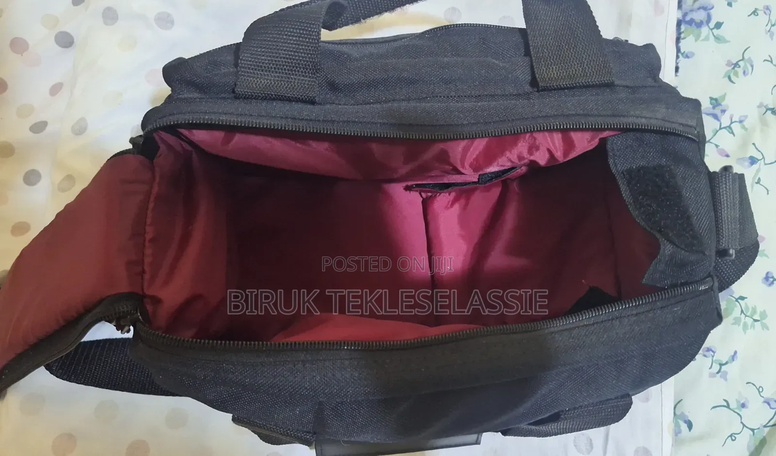 Used Camera Carrying Bag Case With an Adjustable Strap Buckle on Top