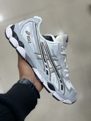 Asics White Running Footwear With Silver Accents and Cushioned Base