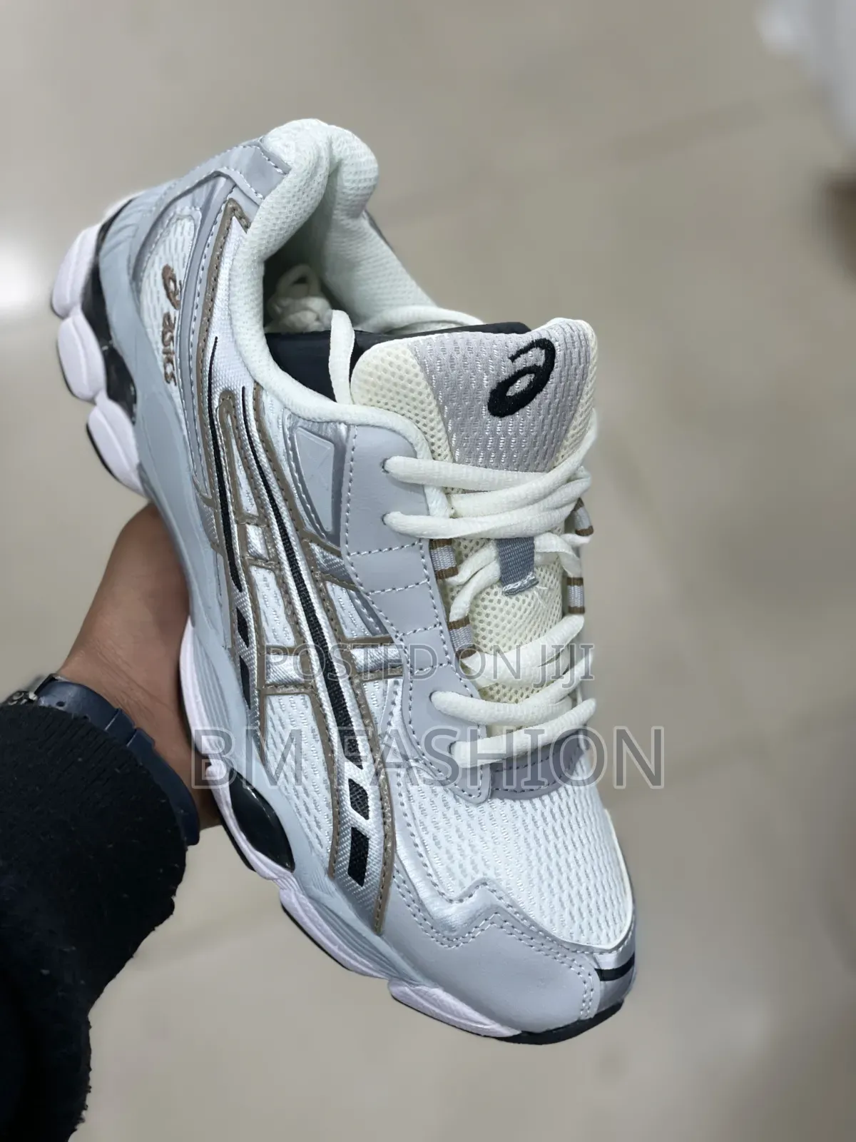 Asics White Running Footwear With Silver Accents and Cushioned Base