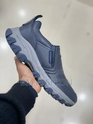 Sketchers Navy Support Walking Footwear Featuring Dynamic Grip Soles