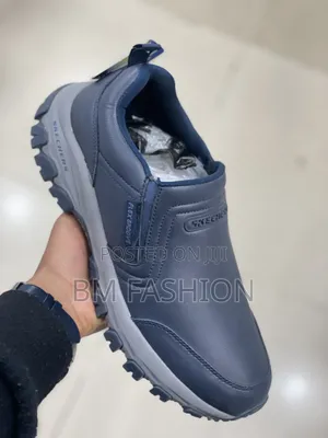 Sketchers Navy Support Walking Footwear Featuring Dynamic Grip Soles