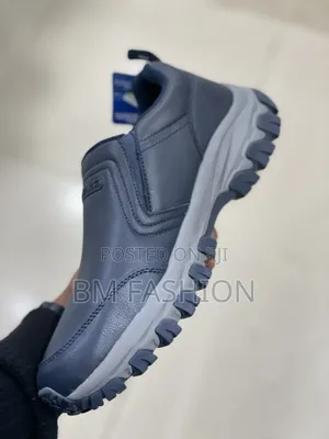 Sketchers Navy Support Walking Footwear Featuring Dynamic Grip Soles